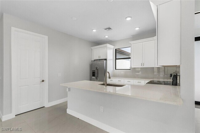 Building Photo - 2435 Tropicana Parkway W