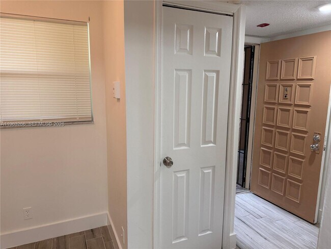 Building Photo - 2700 Coral Springs Dr