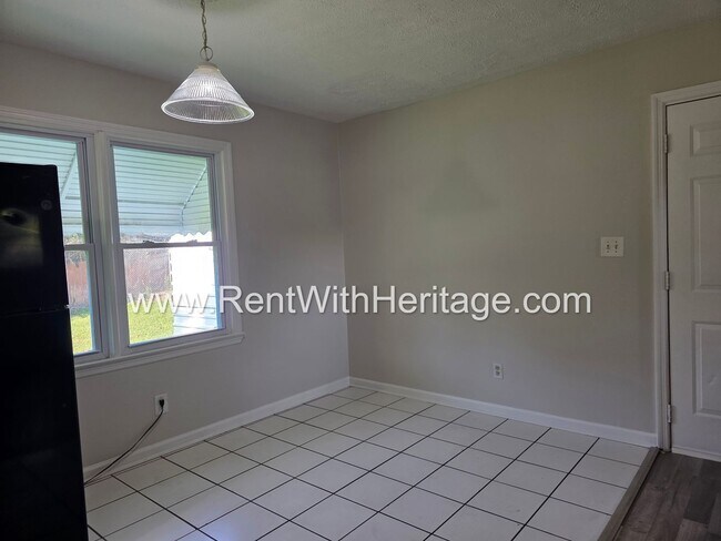Building Photo - 5990 Peco Ln