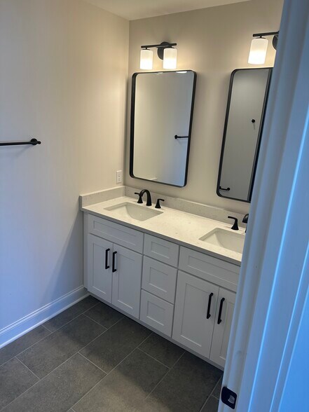 master bath with double vanity - 200 Raymond St