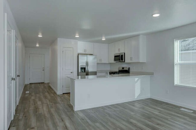 Building Photo - Spacious 4 Bedroom- New Construction with ...