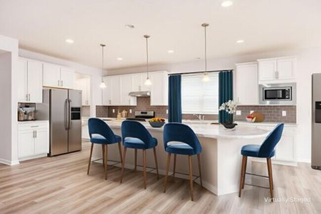 Building Photo - Updated 3-Bedroom Home with 3 Baths, Open-Concept Layout, Luxury Flooring & Bright Modern Kitchen