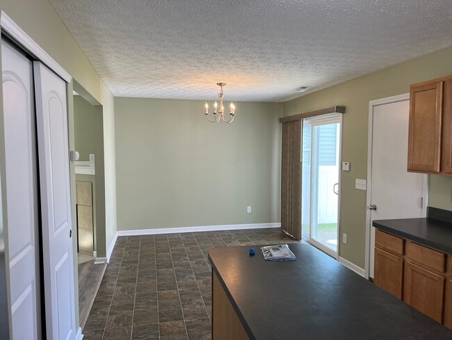 Dining area (empty) - 5537 Goose Falls Dr