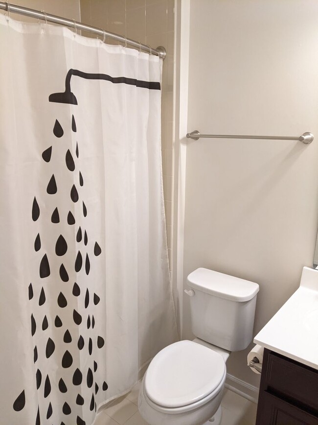 Building Photo - Bottom level (two story) *END UNIT* condo ...