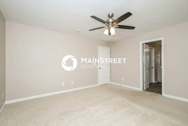 Building Photo - 4 Bedroom Pet-Friendly Home in Locust Grove, GA with Main Street Renewal