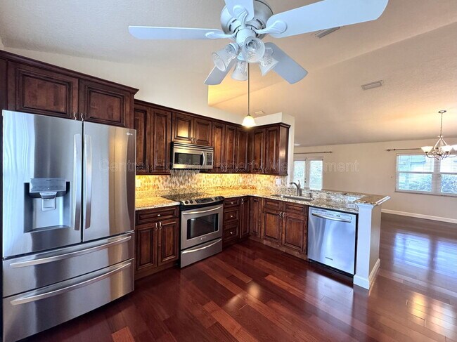 Building Photo - 4818 Breezy Palms Ct