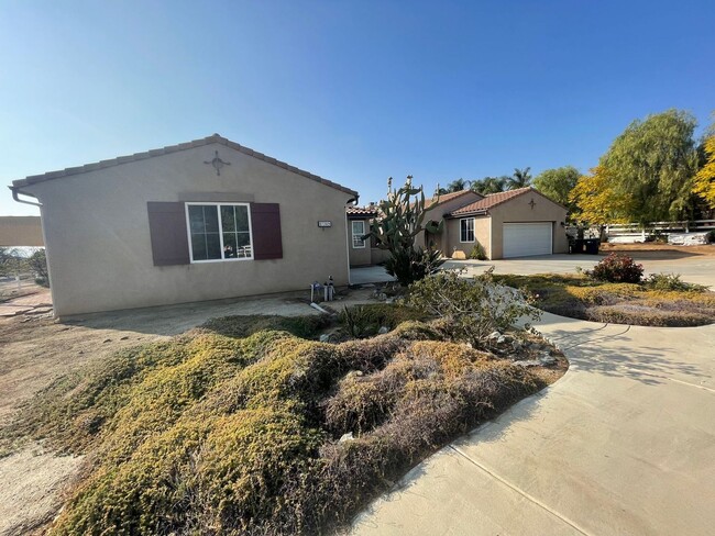 Building Photo - Spacious 4-Bedroom Home in Desirable Woodc...