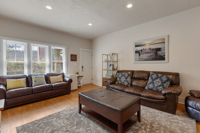 Living room and front door. - 717 E Lakeside Ave