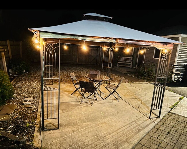 Building Photo - Coastal Charm Meets Comfort — Fully Furnis...