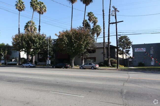 Building Photo - 7260 De Soto Apartments