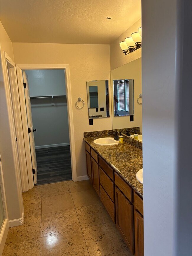 Building Photo - Furnished, 1-Year Long-Term Rental