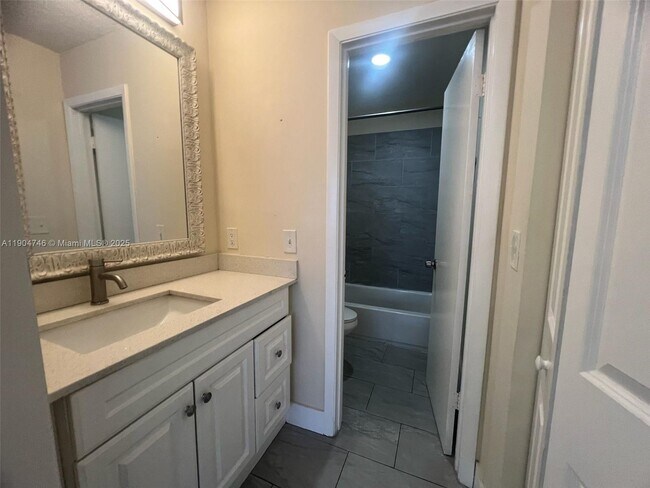 Building Photo - 6560 W 27th Ct