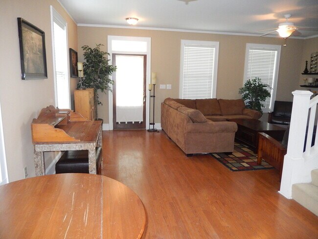 Building Photo - GLAMOROUS 3/2.5 w/ Pond View, Deck, Stainless Appliances, Wood Floors, Fireplace, & More! $2150/m...