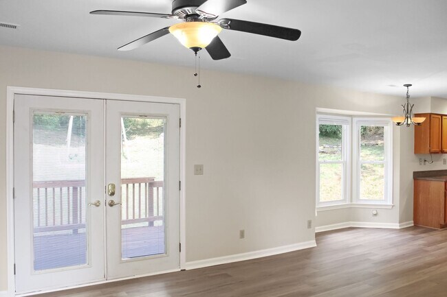 Building Photo - Spacious Raintree Home with Bonus Room, 2-Car Garage and Private Backyard