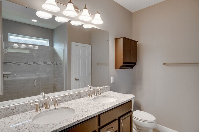 Building Photo - Stunning 3-Bedroom Pool Home with Bonus Room in the Gated Community of Lakeshore at Narcoossee