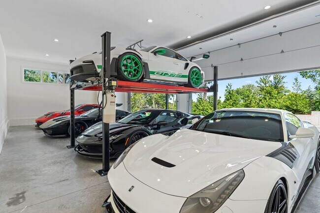 Building Photo - Experience elevated living in this fully furnished luxury residence