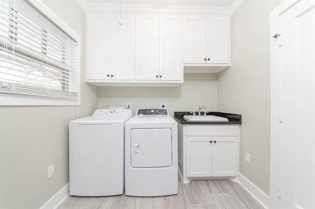 Laundry room with storage closet - 1517 Eastwood St