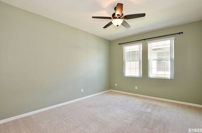 Building Photo - Gorgeous 4/3.5 Home with a Large Fenced Ba...