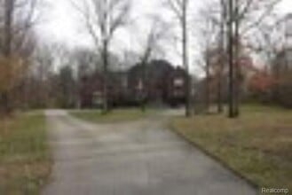 Building Photo - 6986 Montgomery Dr