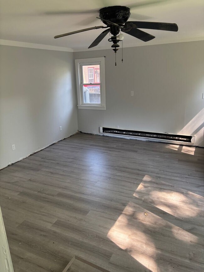 Building Photo - Perfect Home for You and Your Pup! Dog House Included + Fenced Yard