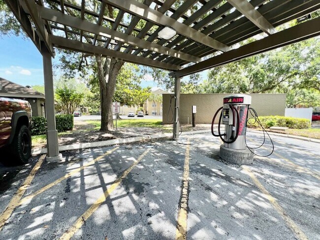 Building Photo - NEW-Remodeled bathroom & kitchen! NEW VINYL PLANK flooring & fresh paint! 2 bedroom 1 bath condo ...