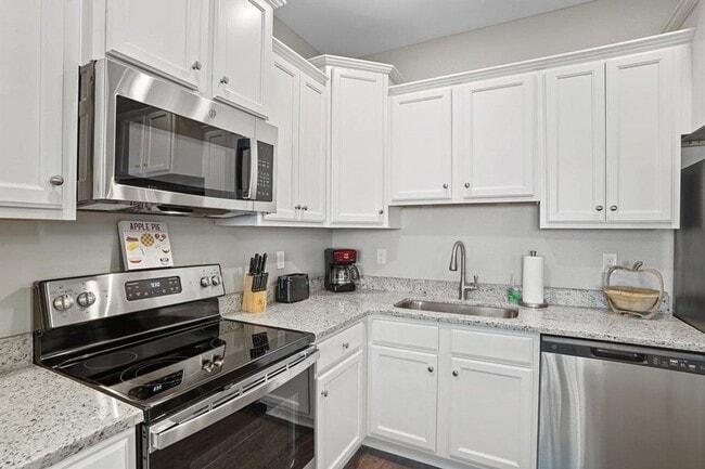 Building Photo - Modern 3/3 Condos with Private Baths & Lux...