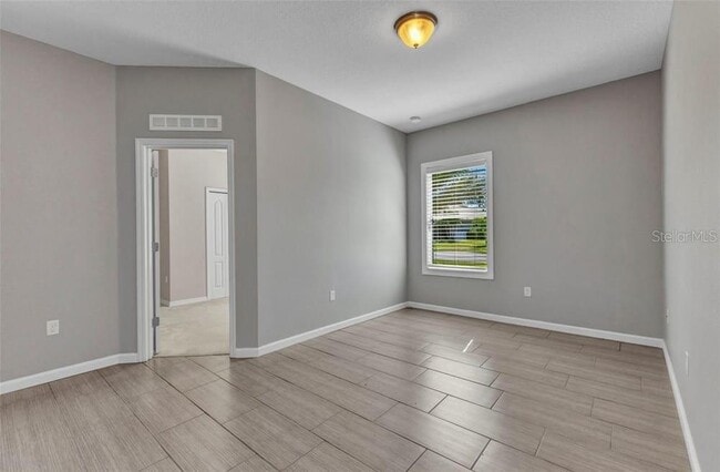 Building Photo - 2640 Suncoast Lakes Blvd