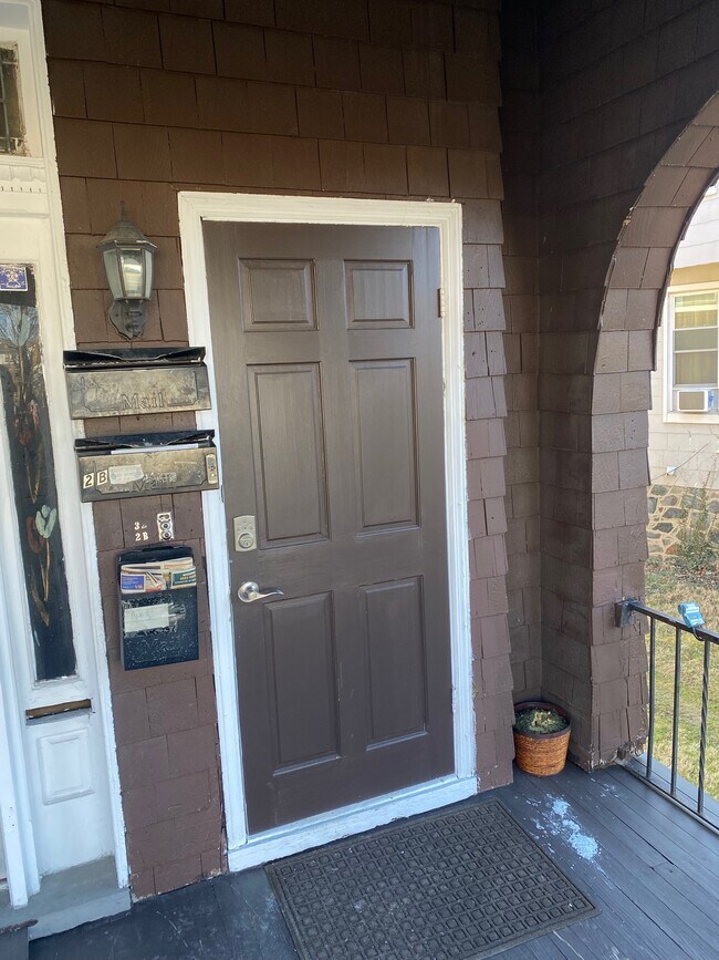 Main front door with electronic keylock - 4103 Liberty Heights Ave