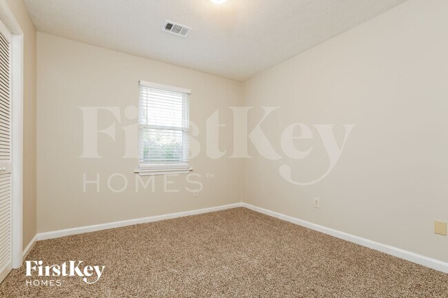 Building Photo - 6585 Evans Dr