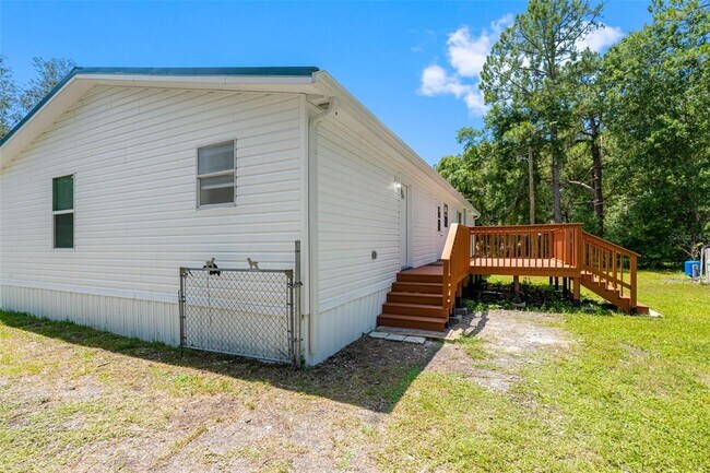 Building Photo - 6847 Woodsman Dr