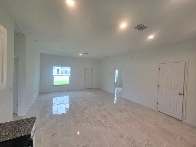 Building Photo - Brand New 3 BEDROOM 2 BATH AND ONE CAR GAR...