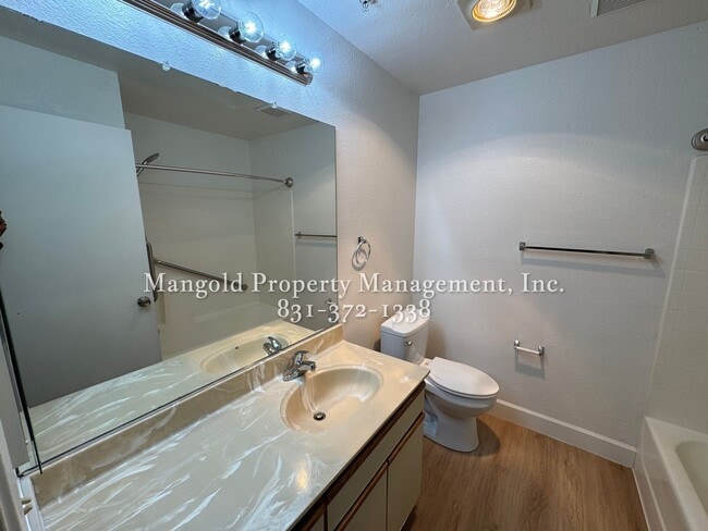 Building Photo - Spacious 2-Bed, 2-Bath Condo with Fireplac...