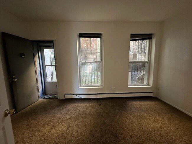 Building Photo - "Chic Urban Oasis: Cozy 1-Bedroom Apartment in Vibrant Brooklyn Locale!"