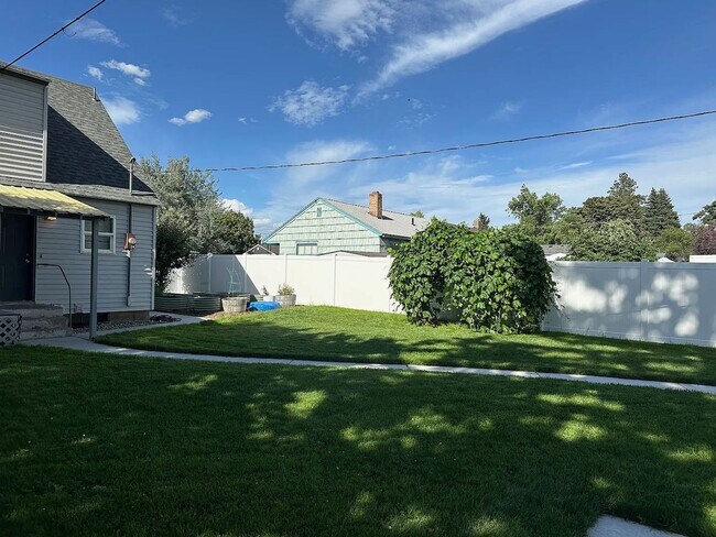 Building Photo - Ideally Located and Updated 4 Bed 2 Bath Fully-Fenced Home w/ Detached Garage/Shop!