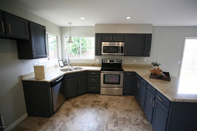 Building Photo - 5841 W Angela Dr