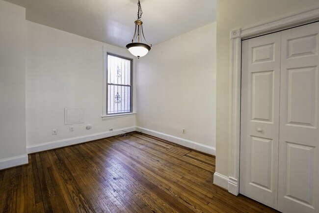 Building Photo - Historic & Charming 3BR Rowhouse near Howard is Move-in Ready!