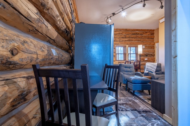 Building Photo - Charming Log Cabin and Carriage House – Do...