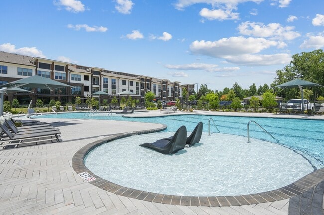 Salt-Water Pool - Resort-style pool with sun shelf, cabanas and grills for relaxing and entertaining close to home. - The Rylan Vintage Park