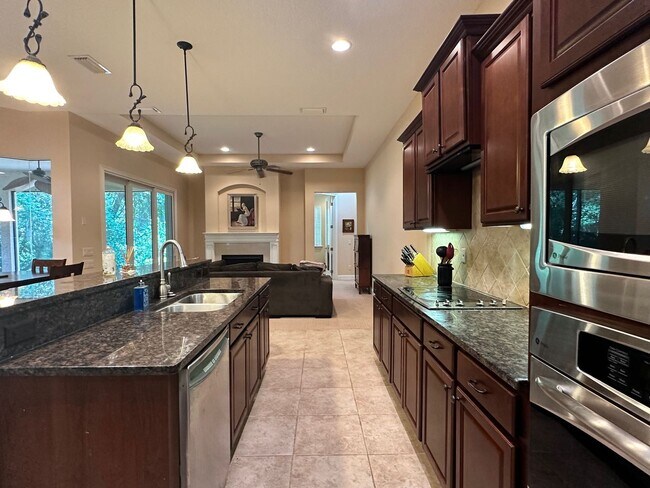 Building Photo - Gated Community! Walking Distance to the B...