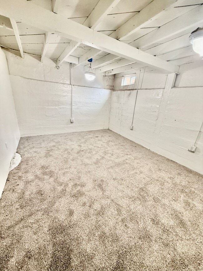 Building Photo - Renovated 3 bed 1 bath fenced yard and storage shed