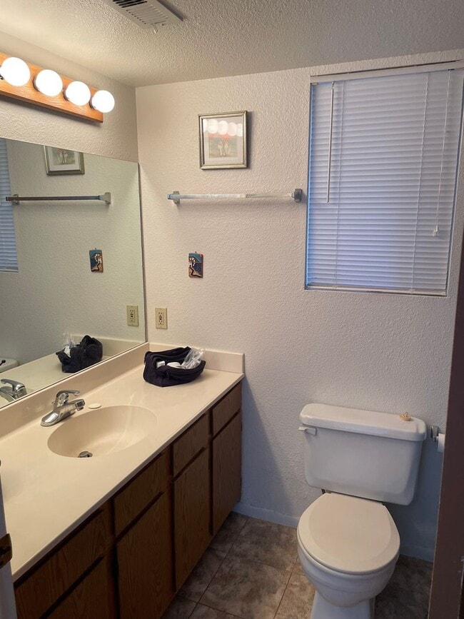 Building Photo - Tierra Sienna Condo