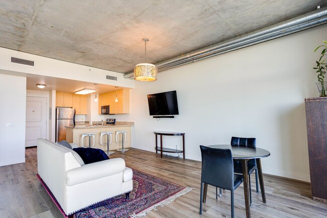 Building Photo - Stunning 16th-Floor Smart Corner Loft with...