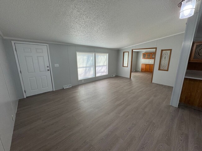 Building Photo - Very large yard great location a nice older doublewide Home