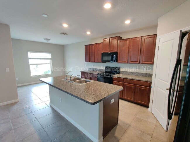 Building Photo - 7408 French Marigold Ave.