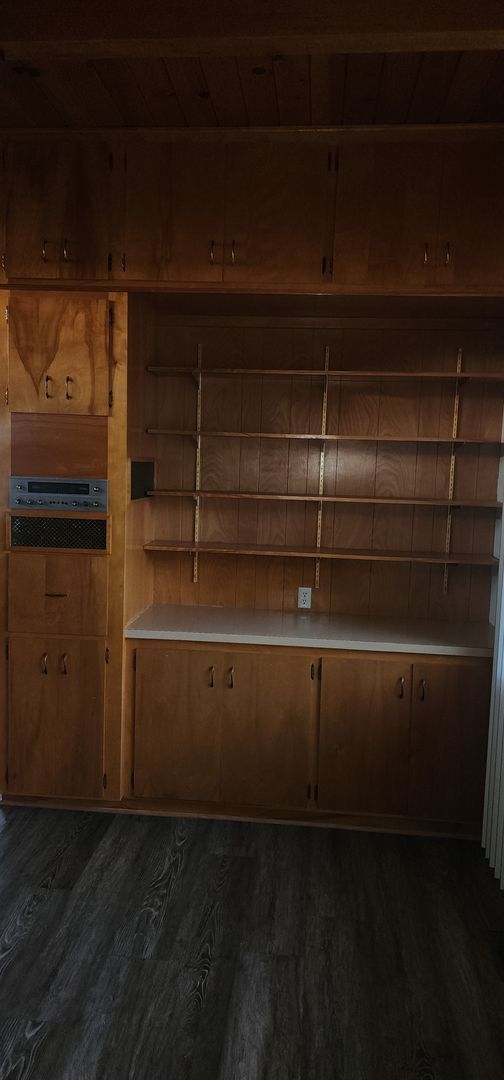 Building Photo - This is a spacious house featuring four bedrooms and two bathrooms, along with a two-car garage.