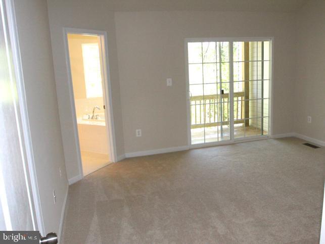 Building Photo - 7568 Stonehouse Run Dr