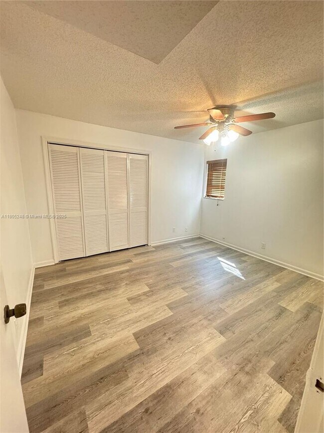 Building Photo - 3111 Coral Springs Dr