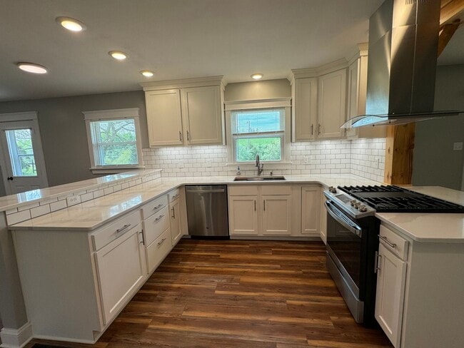 Building Photo - Exquisite Brick Ranch with Modern Upgrades, Countryside Charm And Two Car Garage