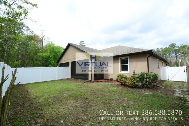 Building Photo - 3 bedroom duplex with fenced yard