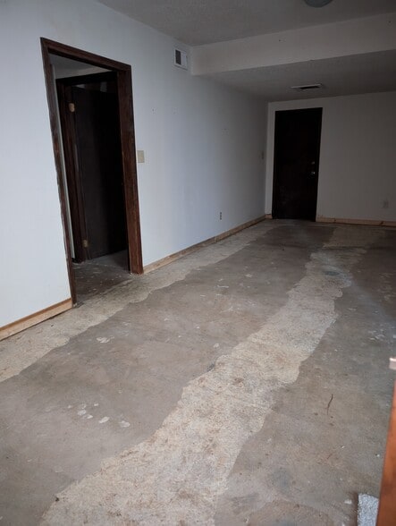 Lower level bonus room facing garage door - 2456 Burgundy Dr